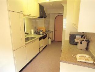 Tabiyu Abrigo Aparthotel Kobe Ruang foto